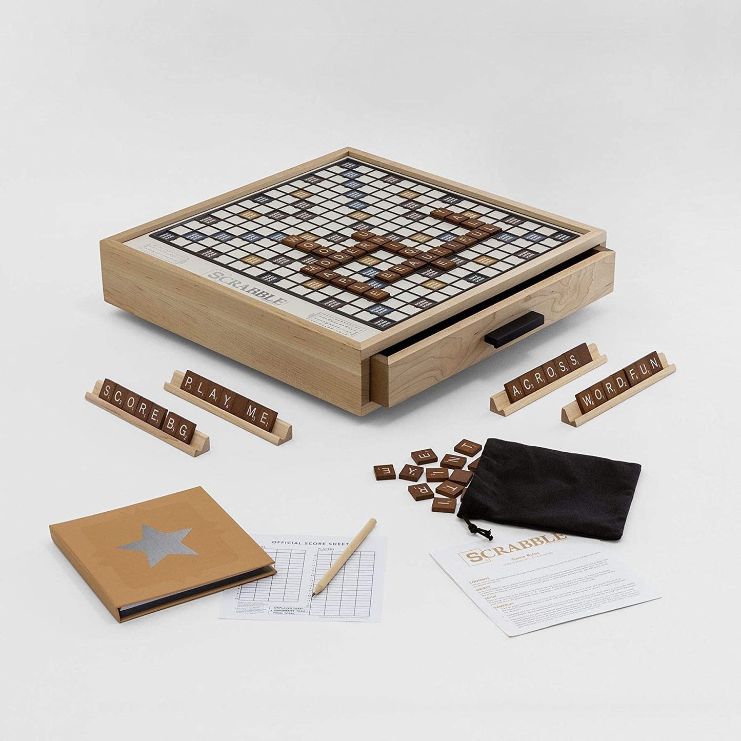 A luxury edition of the classic Scrabble game which is in a maple wood rotating cabinet. Tile pieces are laid out on the game board.