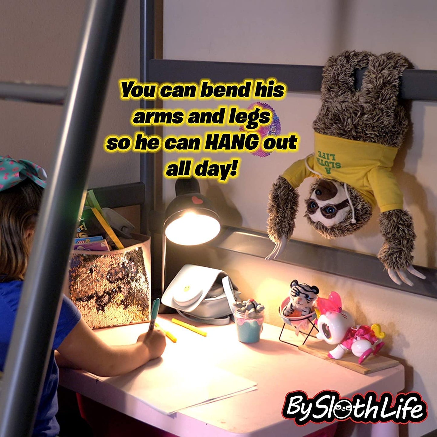 A sloth plush toy hanging upside down in a child's room. There is text which reads, 'You can bend his arms and legs so he can hang out all day.'