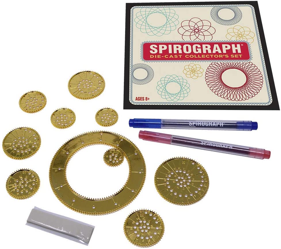 The contents of a Spirograph collectors set. There are die-cast wheels, pens and an instruction manual.