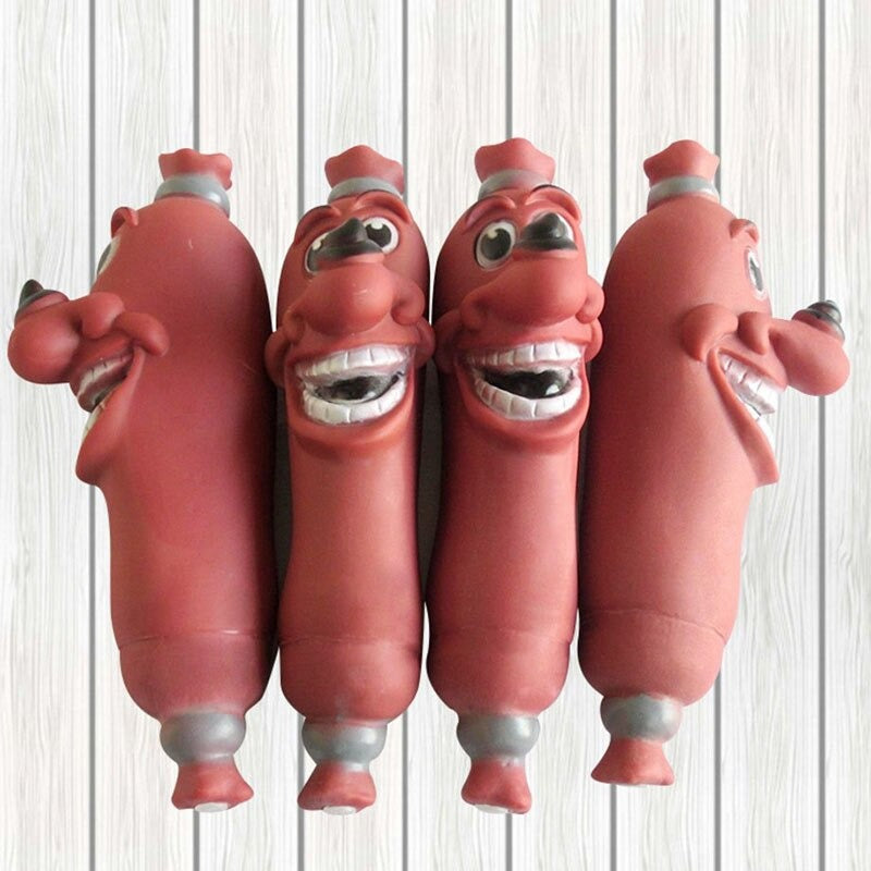 Dog toys which look like sausages and have a face on them. There are 4 sausages