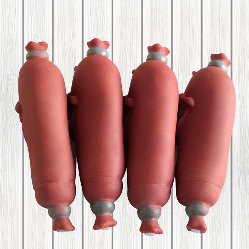 Back view of four brown sausage dog toys.