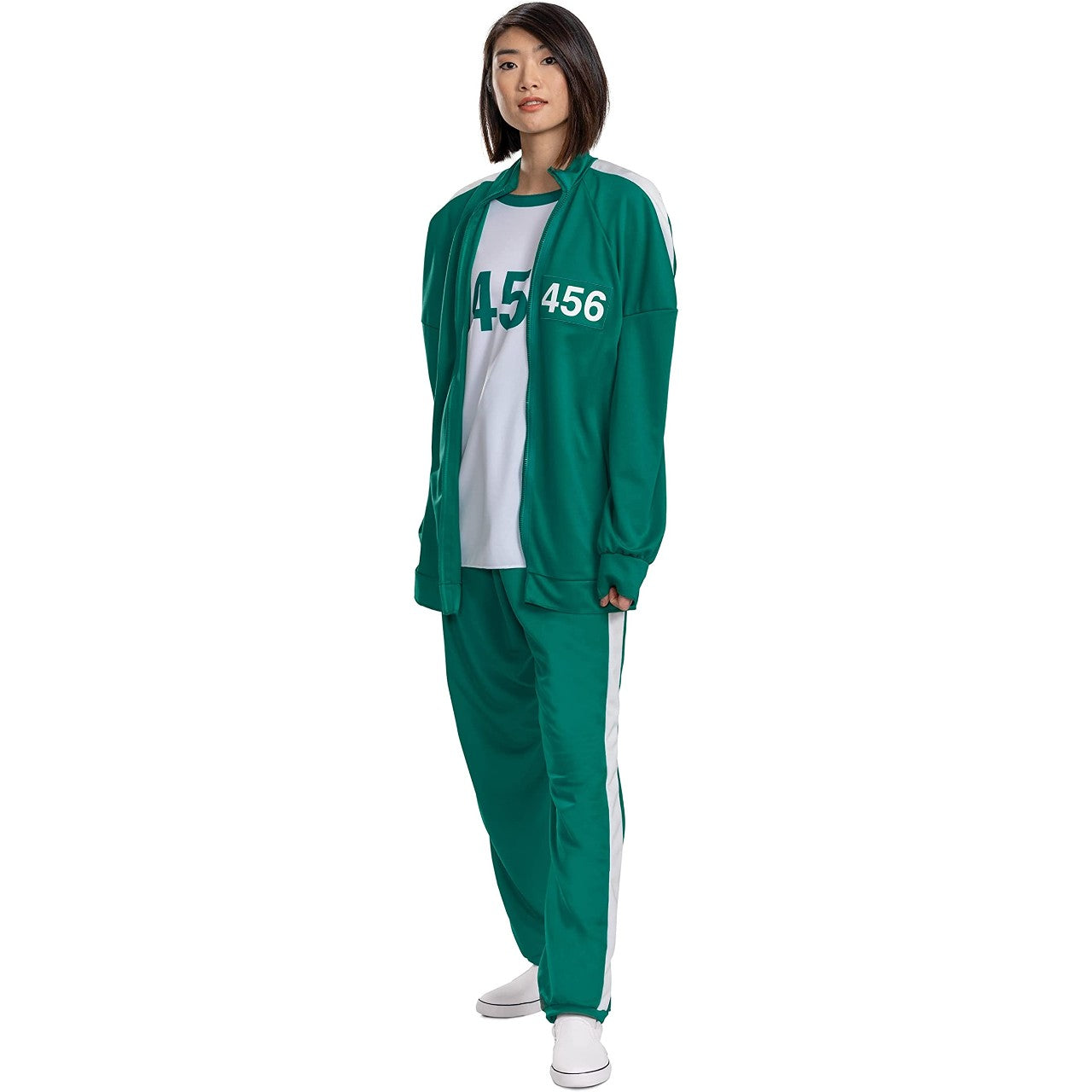 A front view of a woman wearing a a green Squid Game Player 456 adult track suits