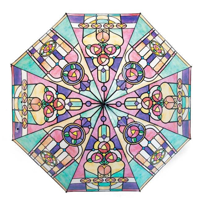 A top view of an umbrella which looks like it is made out of colored stained glass.