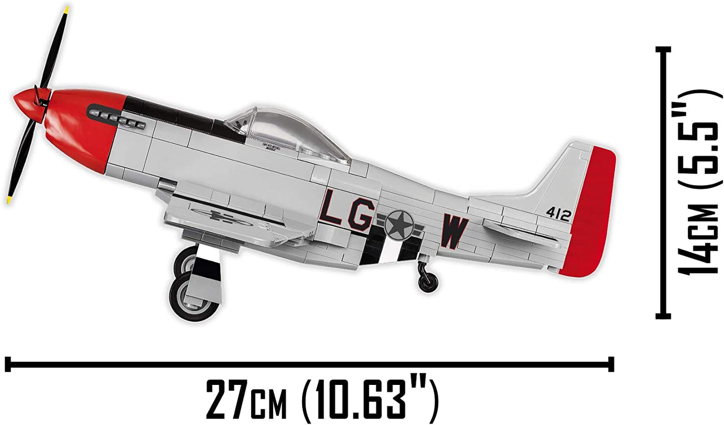 Size measurements for a model miniature version of a Mustang P-51D airplane. It measures 27cm across and 14 cm in height.