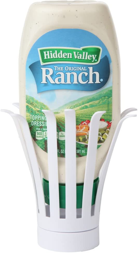 An upside-down condiment sauce holder with a bottle of ranch sauce in the holder. The holders help to draw the sauce to the end of the bottle so you don't need to shake and wait for the sauce to reach the lid.